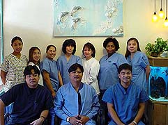 Dentists and staff in the waiting room area